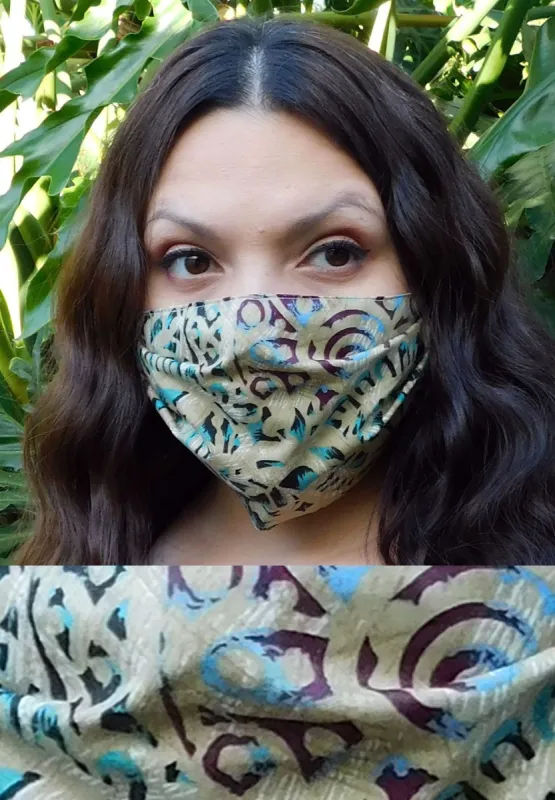 Turquoise and Tan Mask sold by SWAK