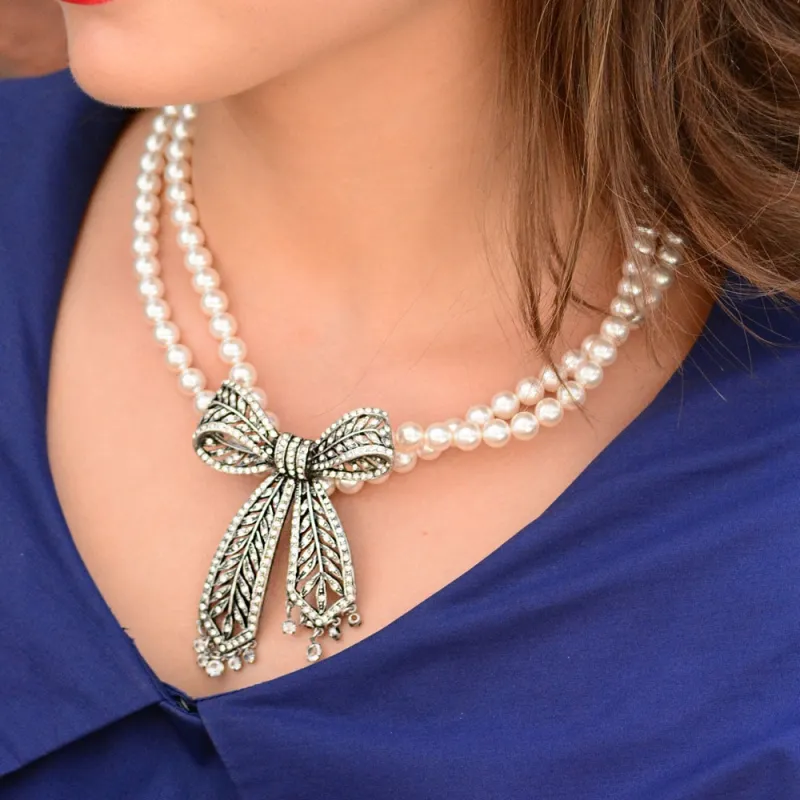 Crystal Bow Pearl Necklace sold by Sweet Romance