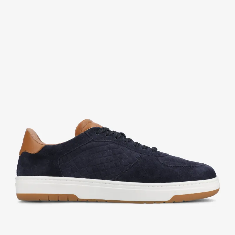 The Rapido Low-top Sneaker in Navy sold by Taft