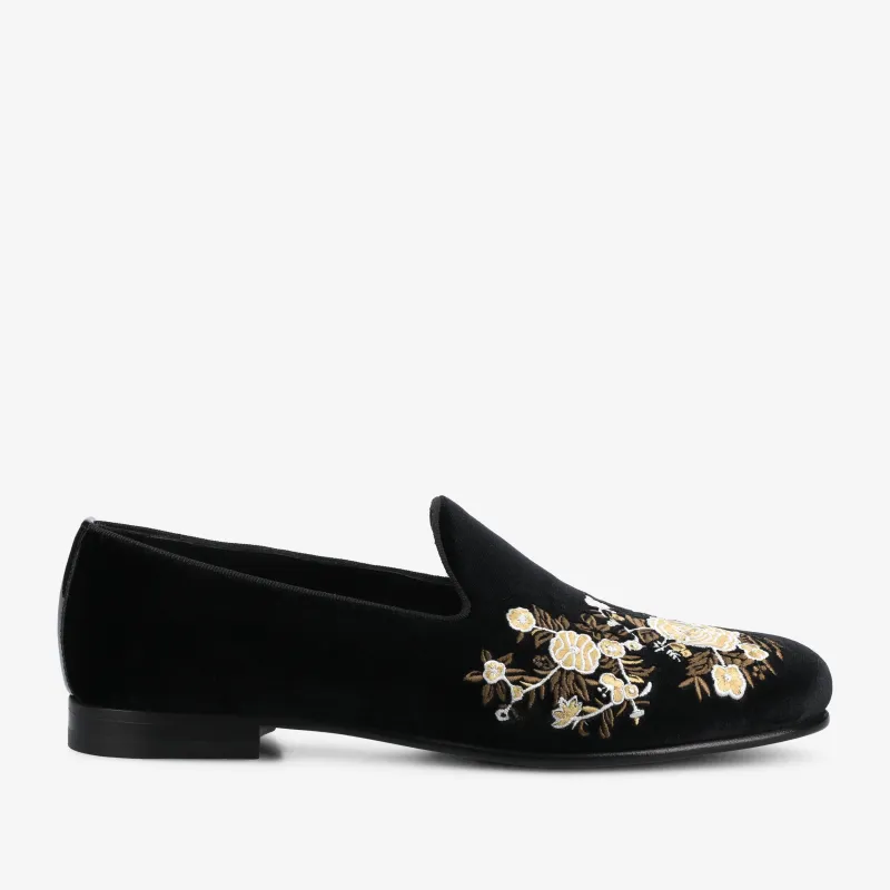 The Estate Slipper in Black Velvet sold by Taft