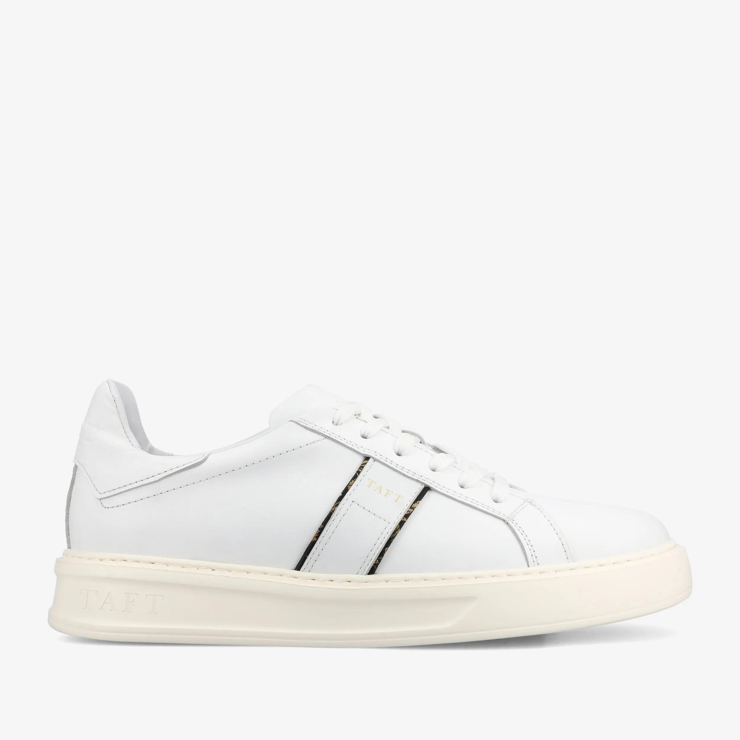 The Logan Sneaker in White sold by Taft