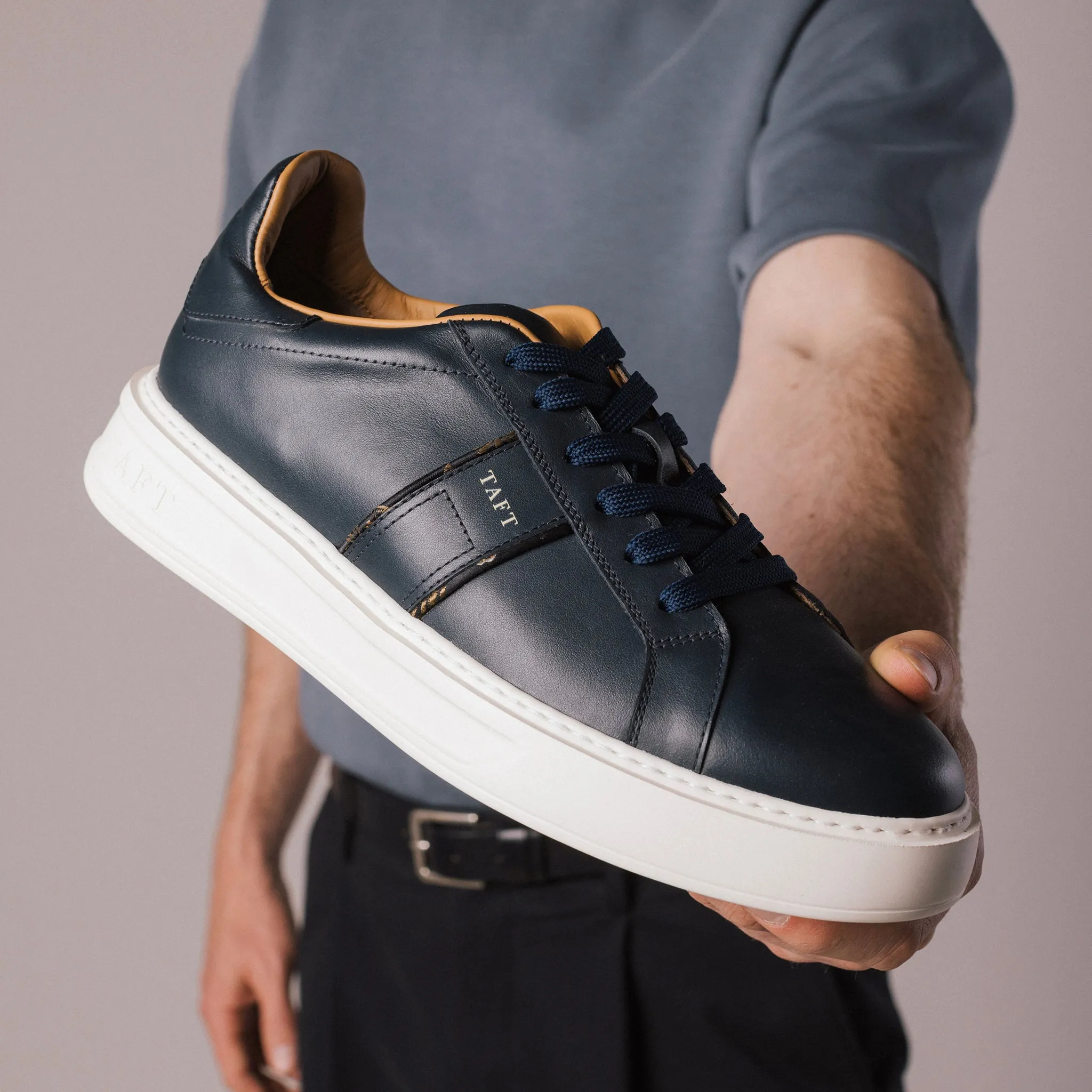 The Logan Sneaker in Navy sold by Taft product image thumbnail 2