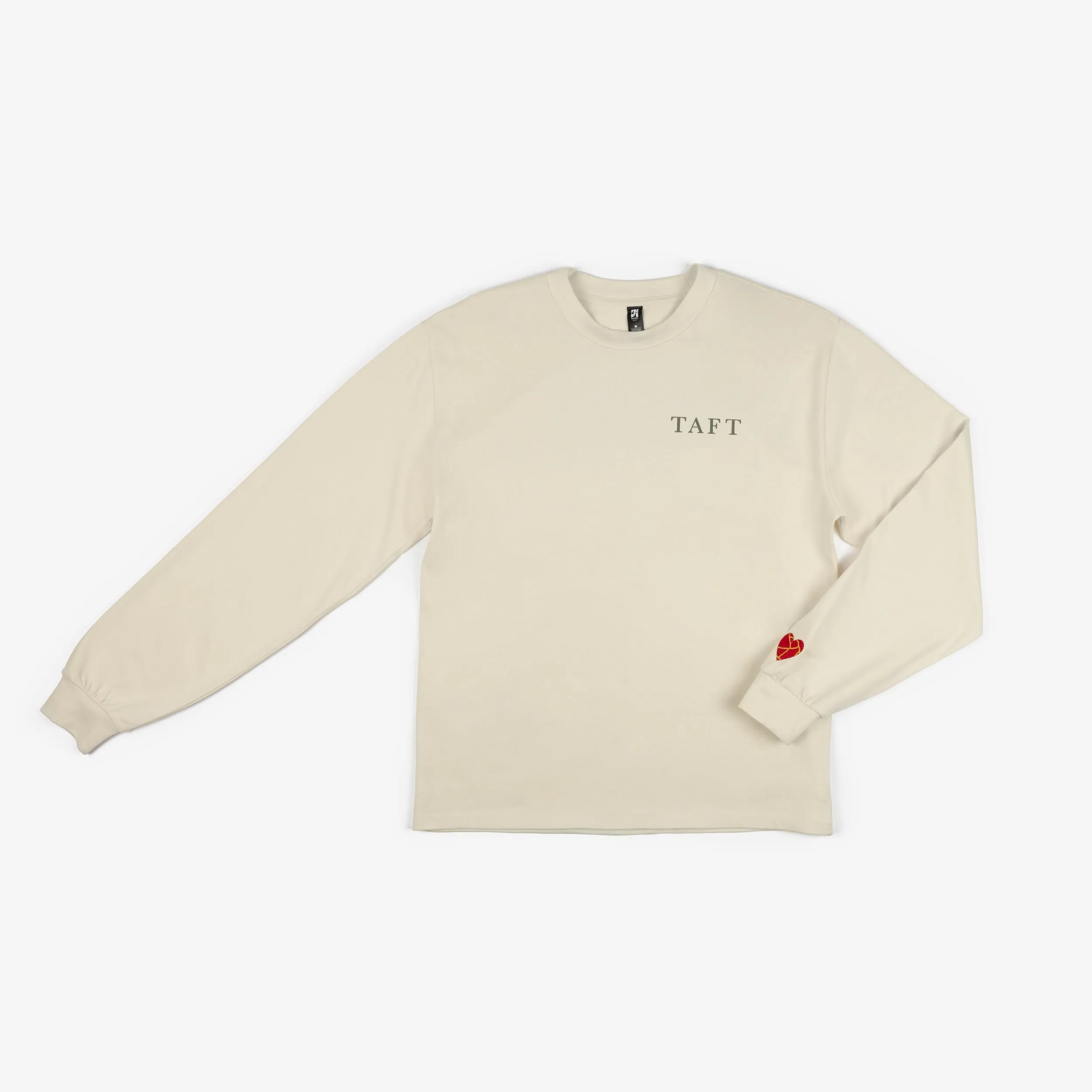 Care Collection Long Sleeve Tee in Ecru sold by Taft