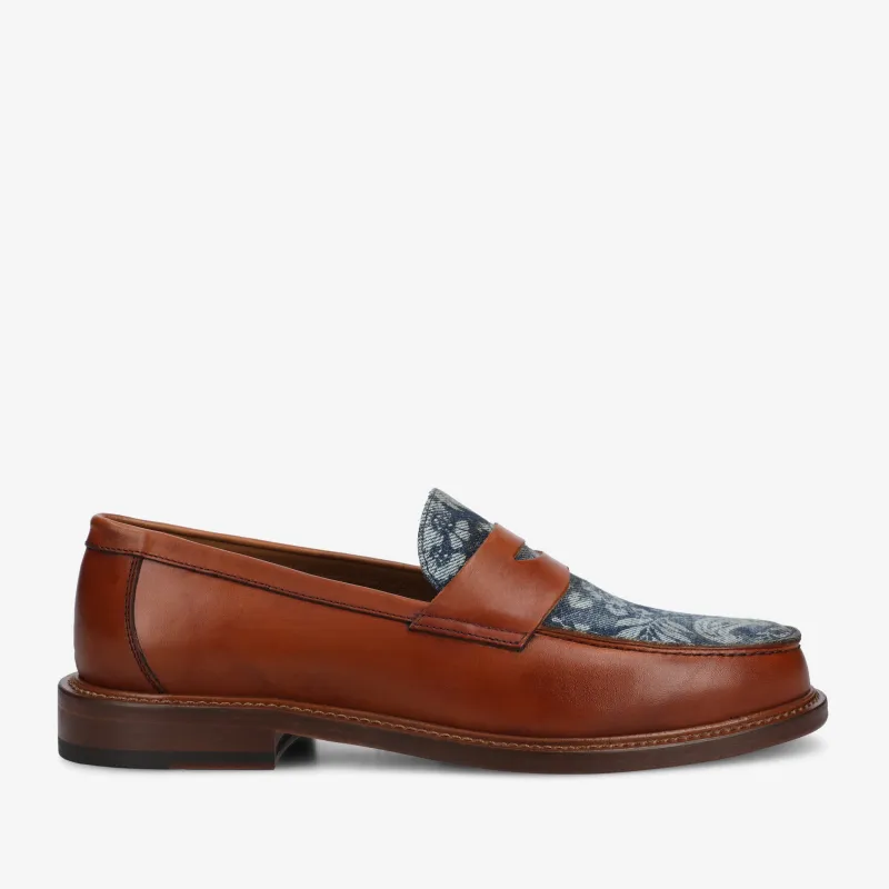 The Jack Penny Loafer in Washed Denim Floral sold by Taft