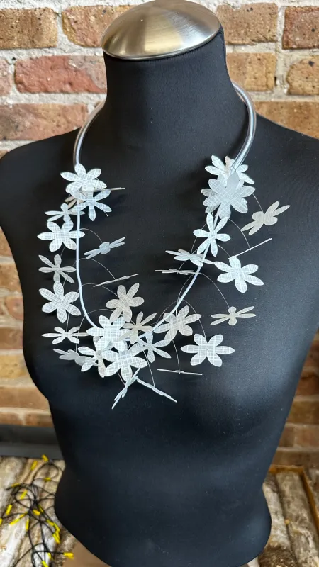 White Lotus Kinetic Necklace sold by Takara