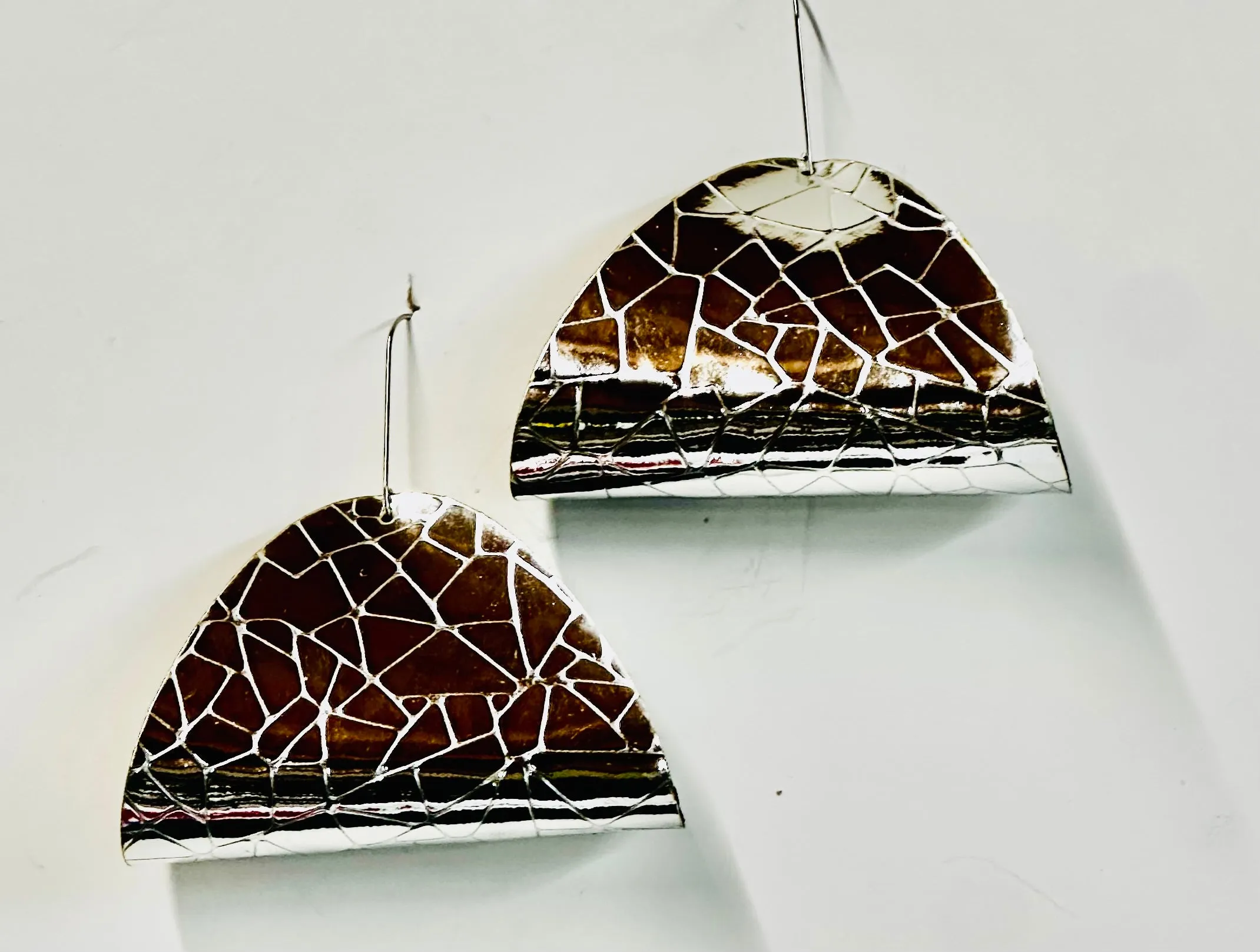 Luna Earrings sold by Takara