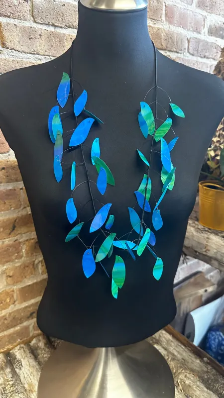 Ocean Waves Kinetics Necklace sold by Takara