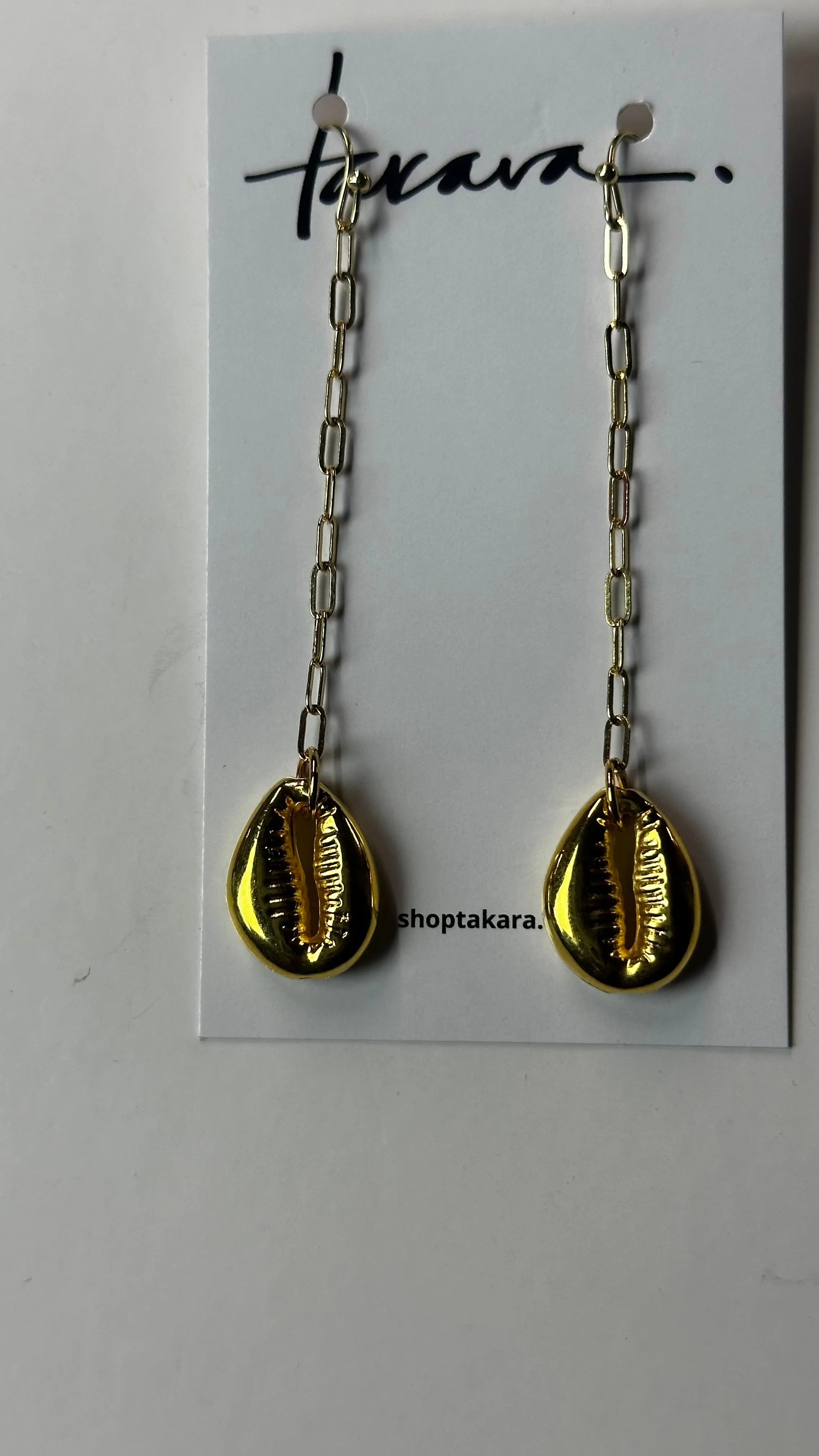 Double Sided Cowrie Earrings sold by Takara