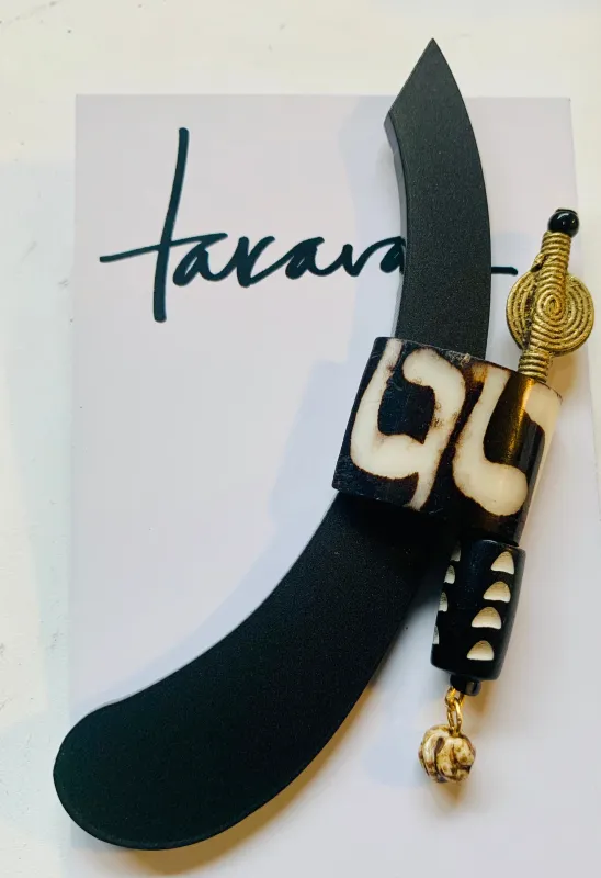 African Mudbone / Vintage Metal Earring sold by Takara