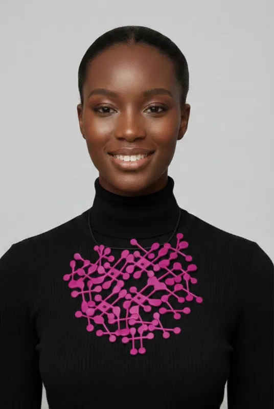 Criss Cross Felt Bib made by Takara