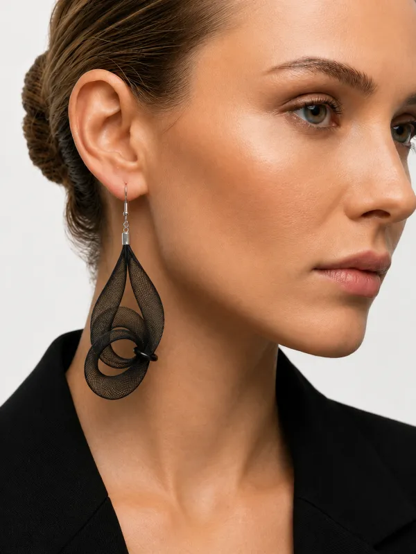 Zaha Earrings made by Takara