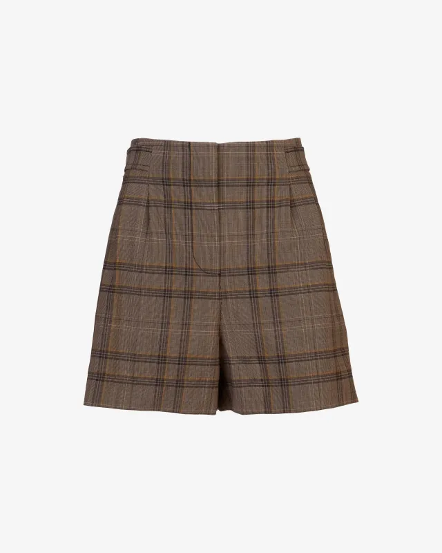 Malek Short sold by Tanya Taylor