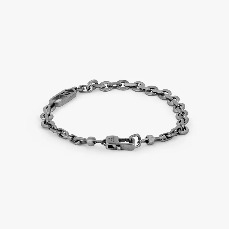Catena Signifier Rogato Rolo Chain Bracelet in Black Rhodium Silver with "T" Logo sold by Tateossian
