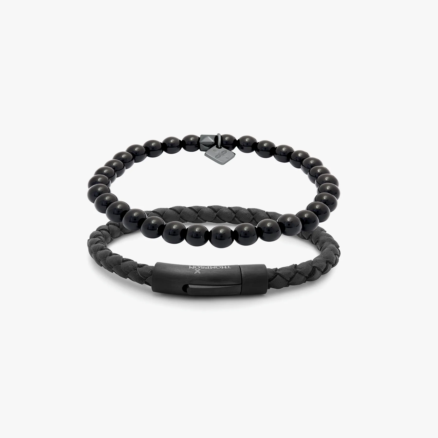 THOMPSON Black IP steel Tubo Classico Set bracelets in black leather sold by Tateossian