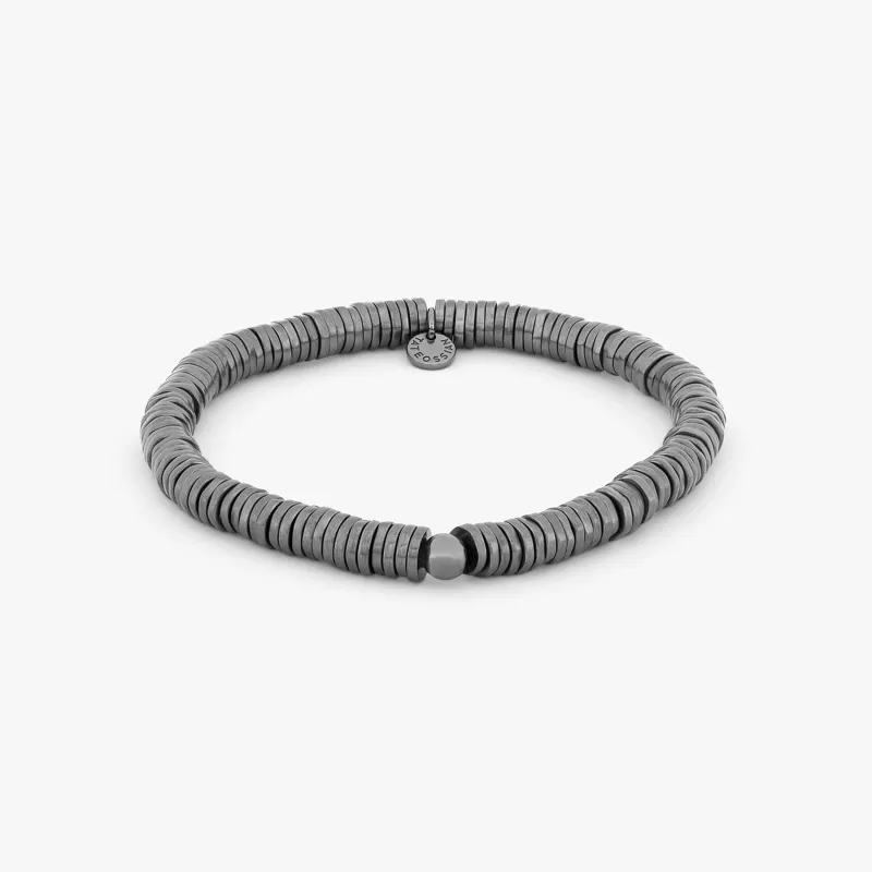 Pure Disc Expandable bracelet in black rhodium plated silver sold by Tateossian
