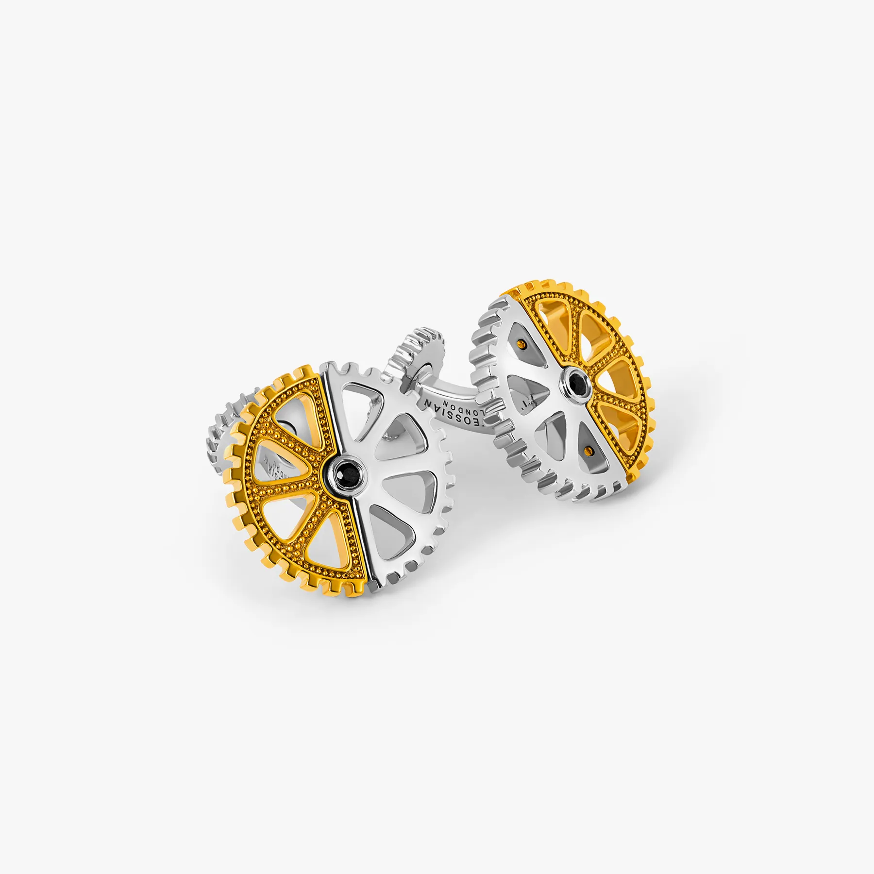Puzzle Gear Cufflinks in Rhodium and Yellow Gold Plated with Black Spinel sold by Tateossian