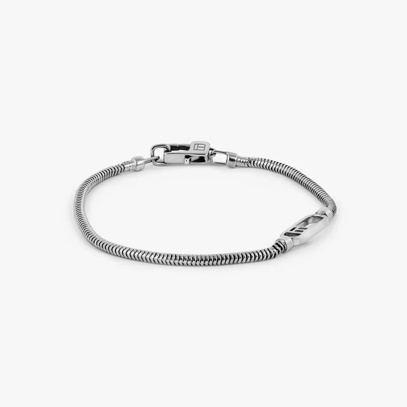 Catena Signifier Snake Chain Bracelet in Oxidised Plated Silver with "T" Logo sold by Tateossian