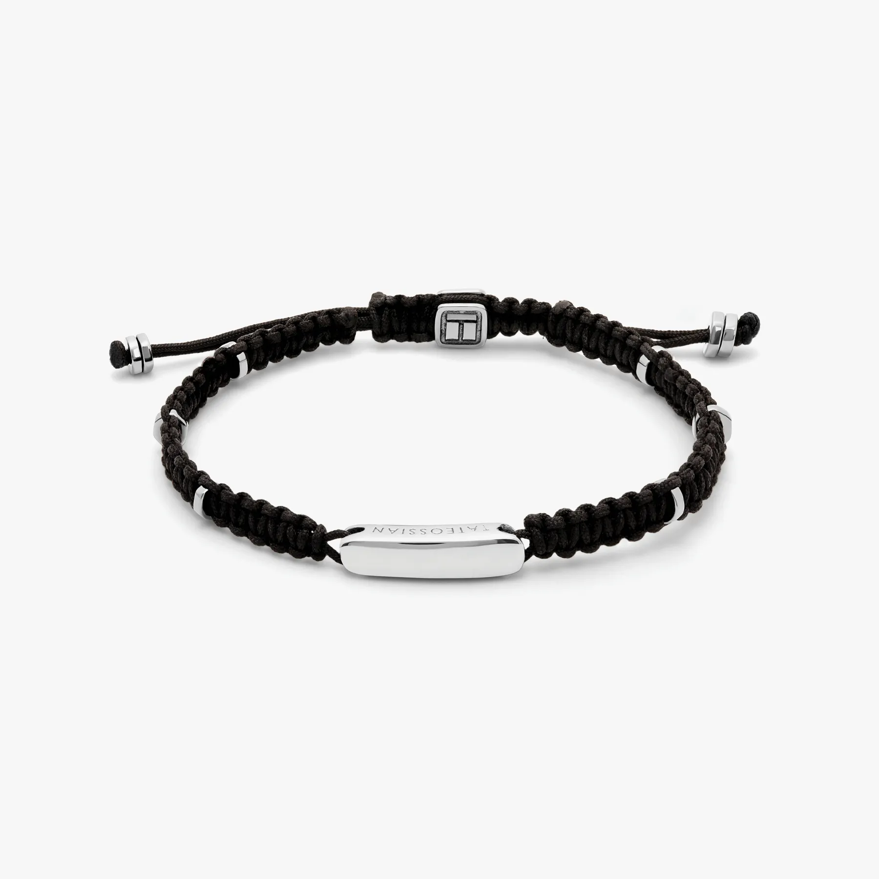 Black macrame bracelet with silver baton sold by Tateossian