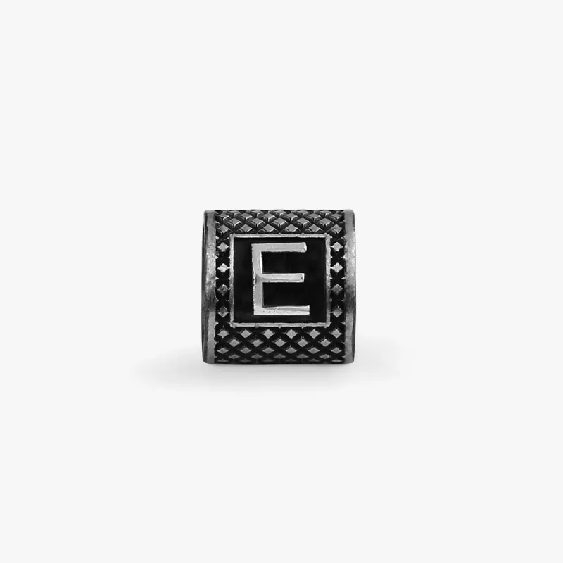 Lucky Me Initial E Charm In Black Rhodium Plated Silver sold by Tateossian