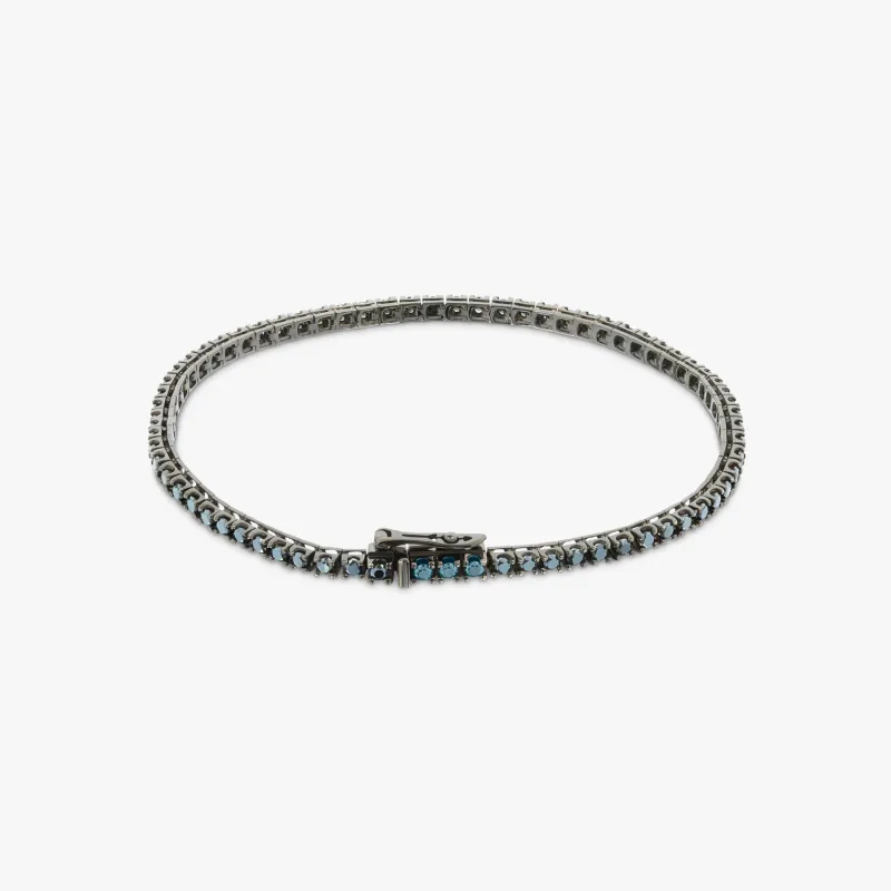 Tennis Bracelet in Black Rhodium Plated 18K White Gold with Black and Blue Diamonds sold by Tateossian