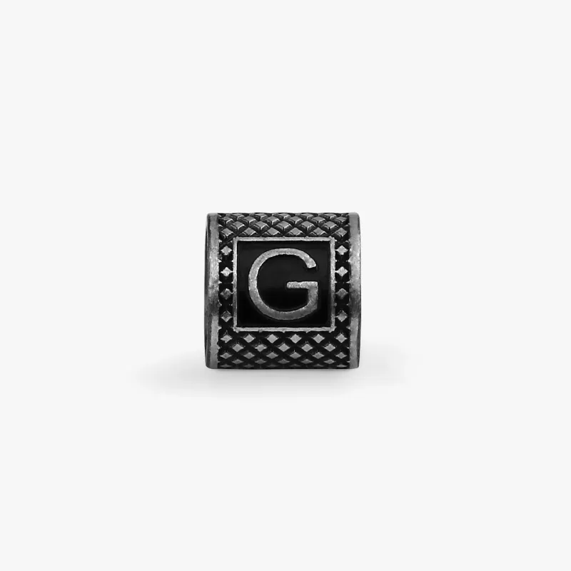 Lucky Me Initial G Charm In Black Rhodium Plated Silver sold by Tateossian