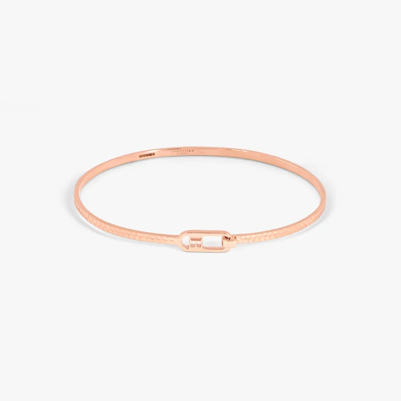 T-bangle in hammered 18k rose gold sold by Tateossian