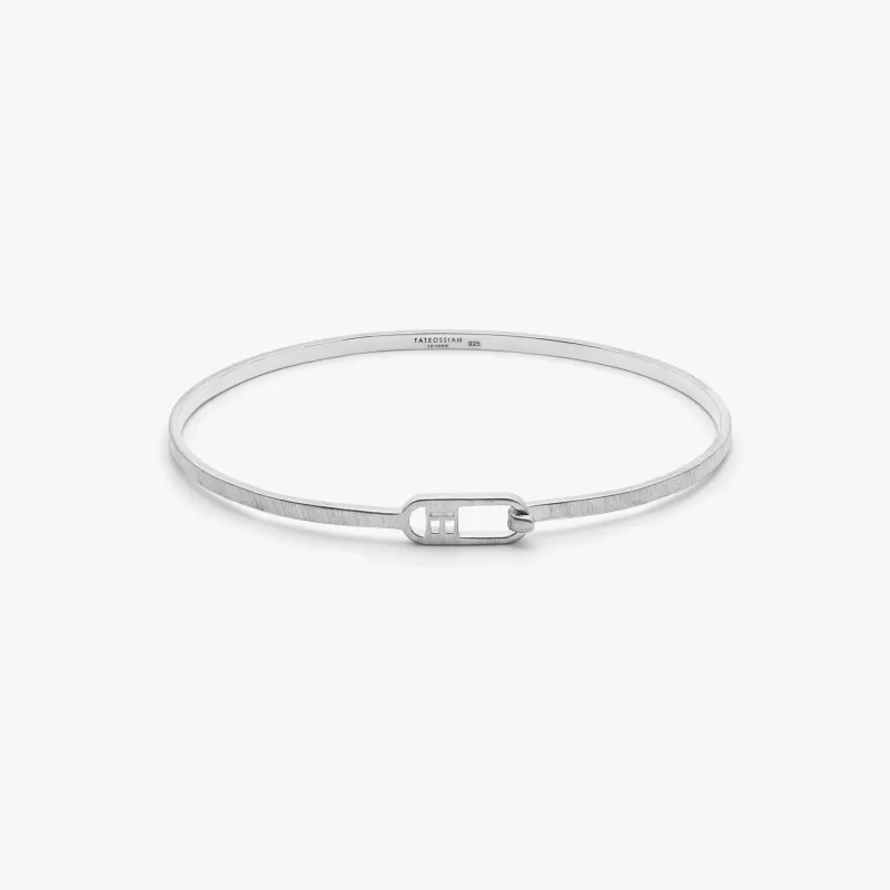T-bangle in brushed sterling silver sold by Tateossian