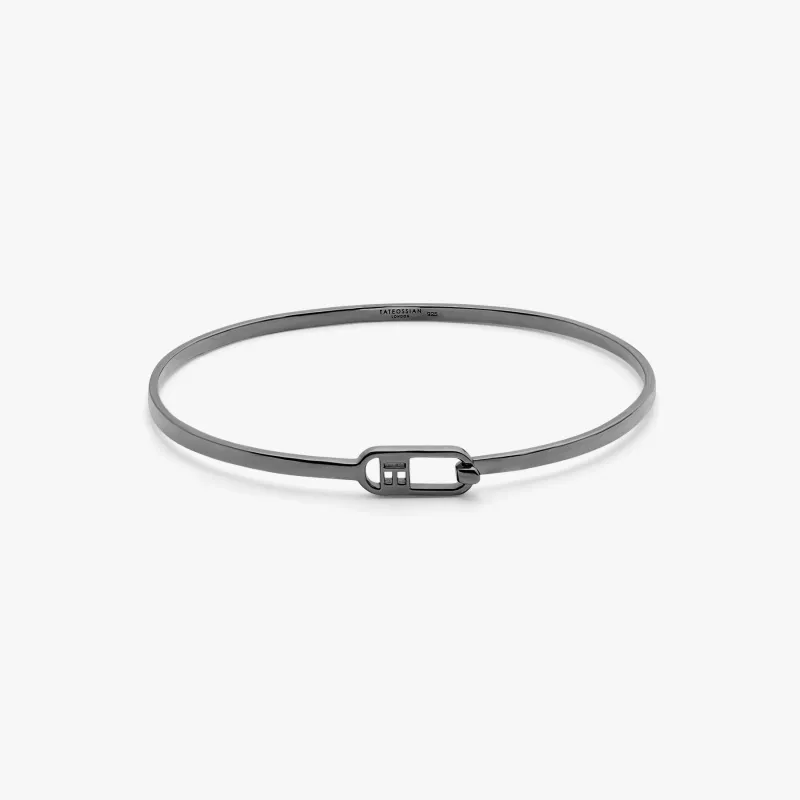 T-bangle in polished black rhodium plated sterling silver made by Tateossian