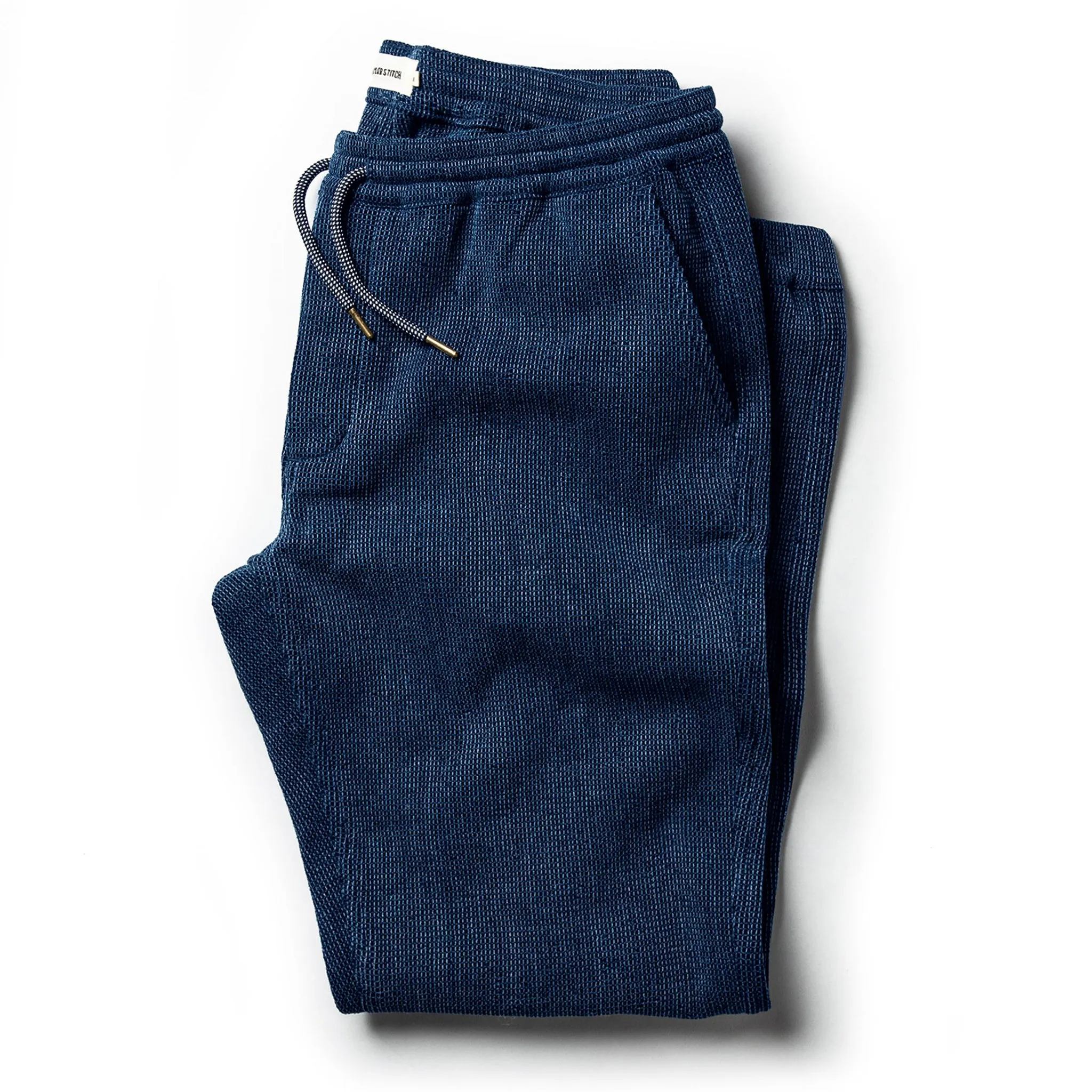 The Apres Pant in Indigo Waffle sold by Taylor Stitch