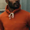 The Fillmore Hoodie in Rust sold by Taylor Stitch