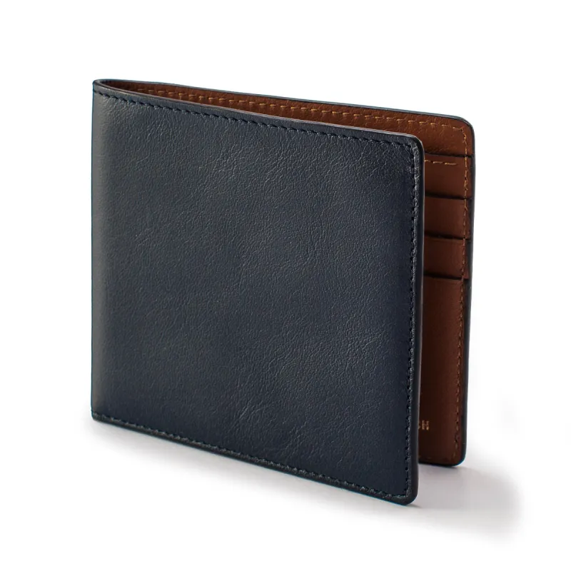 The Minimalist Billfold Wallet in Navy sold by Taylor Stitch