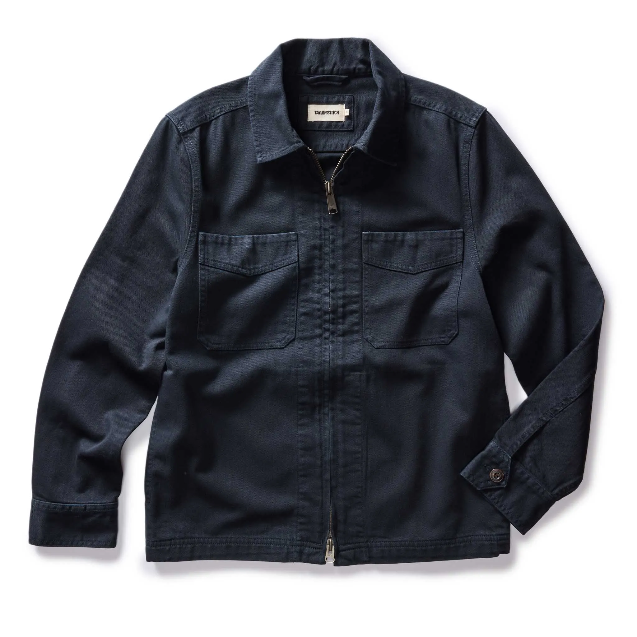 The Station Jacket in Dark Navy Broken Twill sold by Taylor Stitch