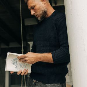 The Fisherman Sweater in Dark Navy sold by Taylor Stitch
