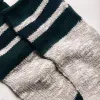 The Camp Sock in Heather Grey sold by Taylor Stitch