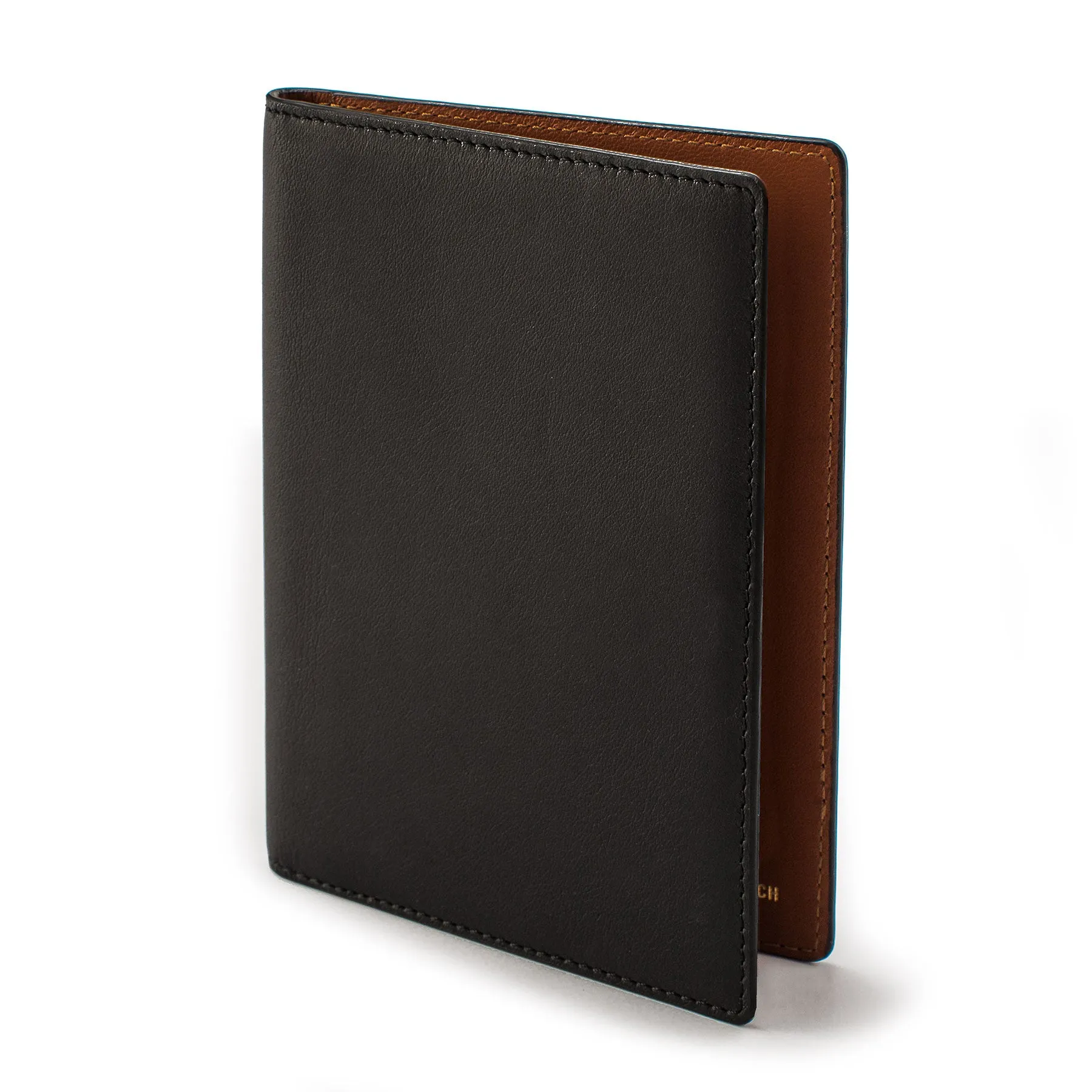 The Passport Wallet in Black sold by Taylor Stitch