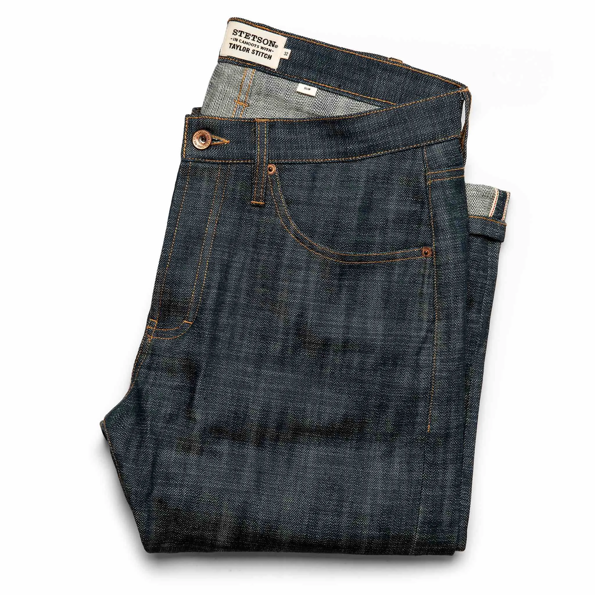 The Slim Jean in Green Cast Selvage sold by Taylor Stitch