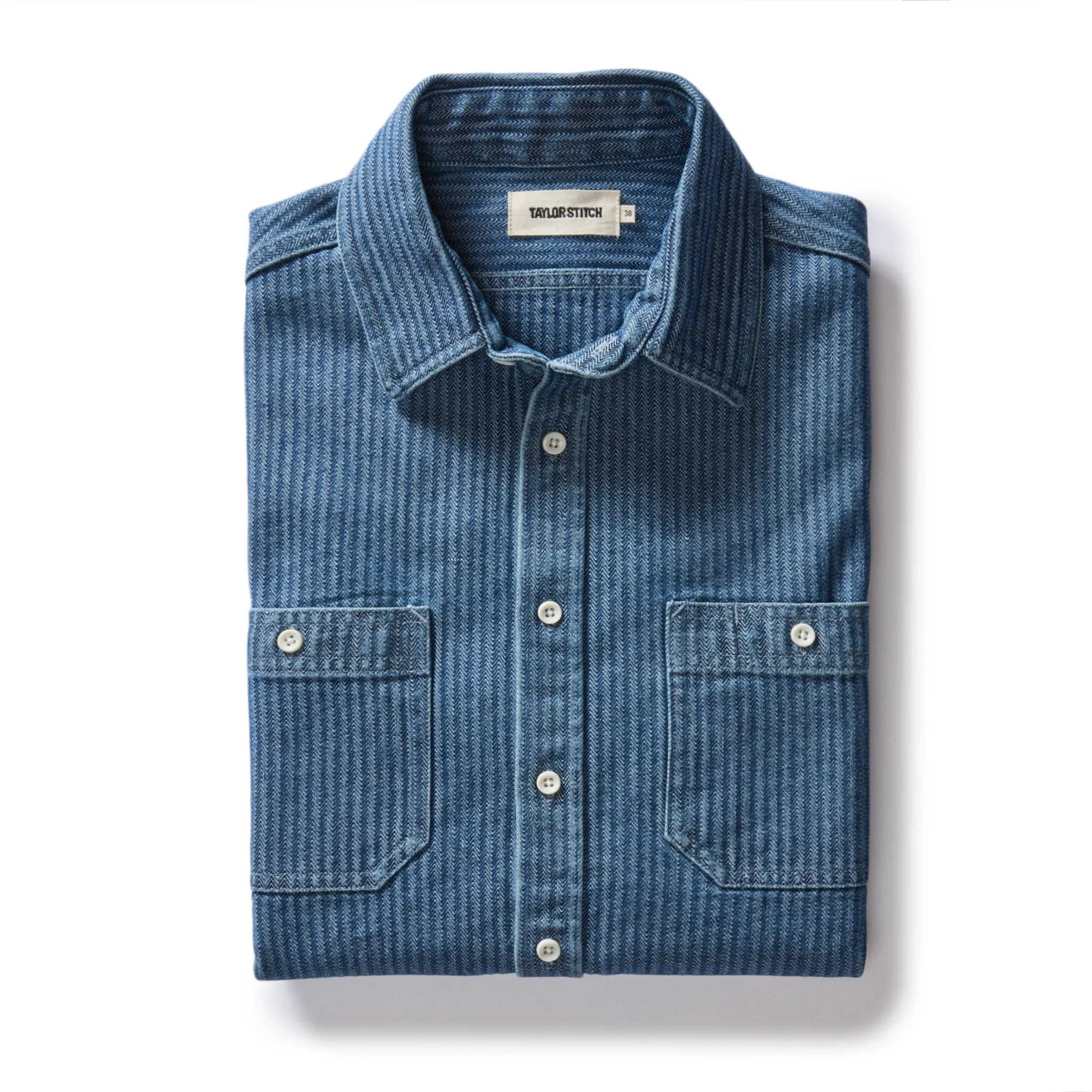 The Utility Shirt in Washed Indigo Herringbone sold by Taylor Stitch