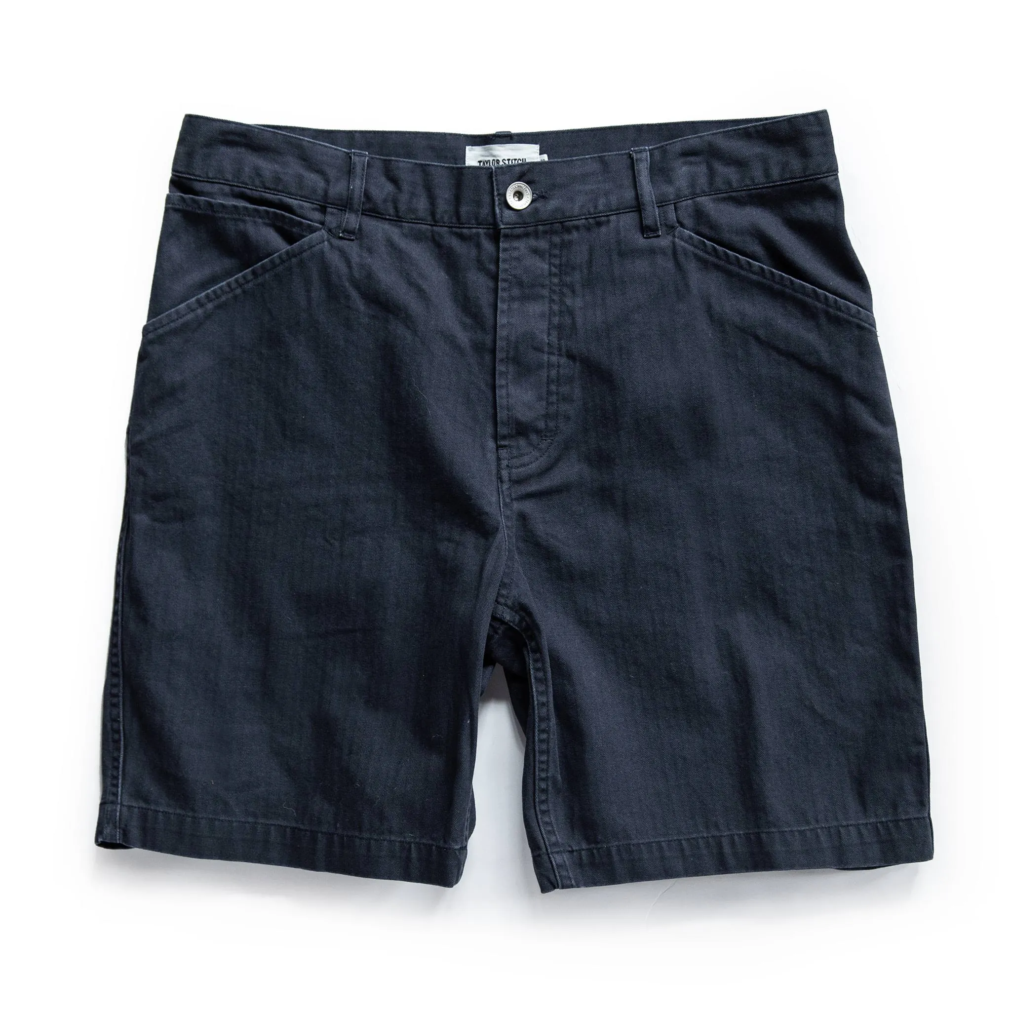 The Camp Short in Navy Herringbone sold by Taylor Stitch
