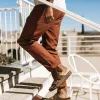 The Camp Pant in Rust Reverse Sateen sold by Taylor Stitch