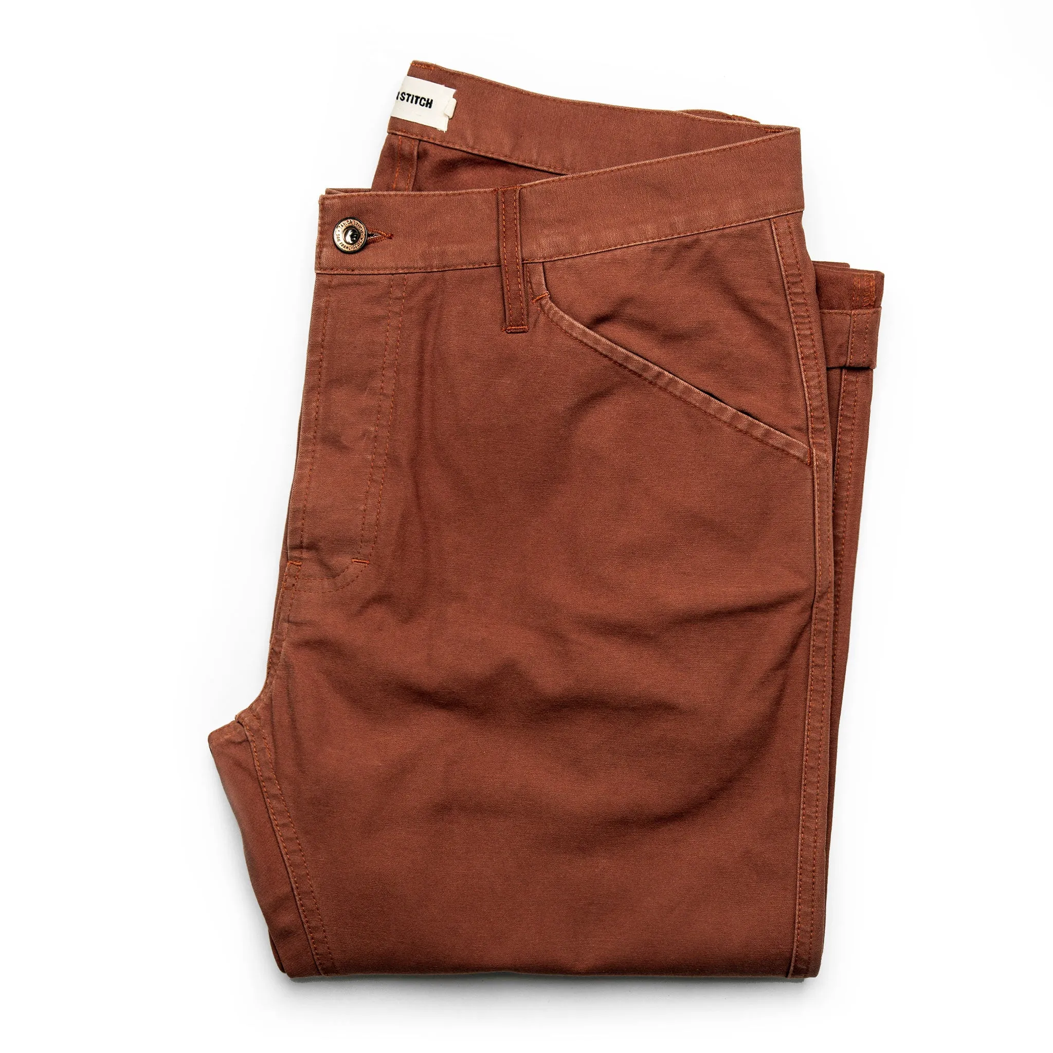 The Camp Pant in Rust Reverse Sateen sold by Taylor Stitch