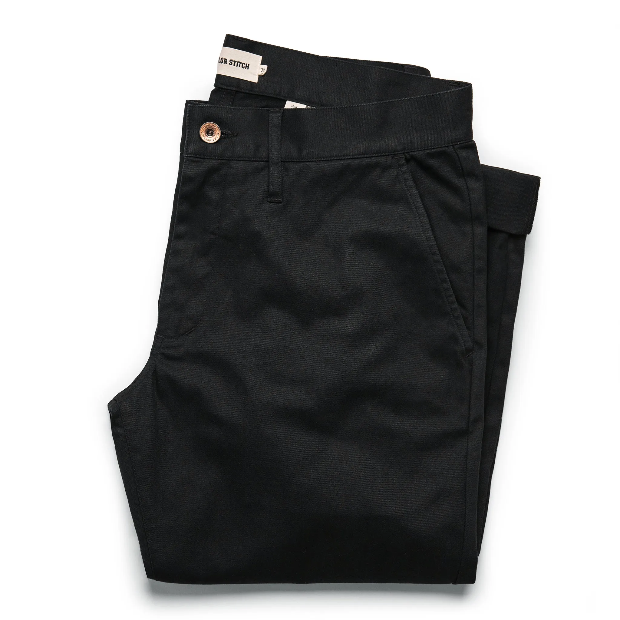 The Slim Chino in Organic Coal sold by Taylor Stitch