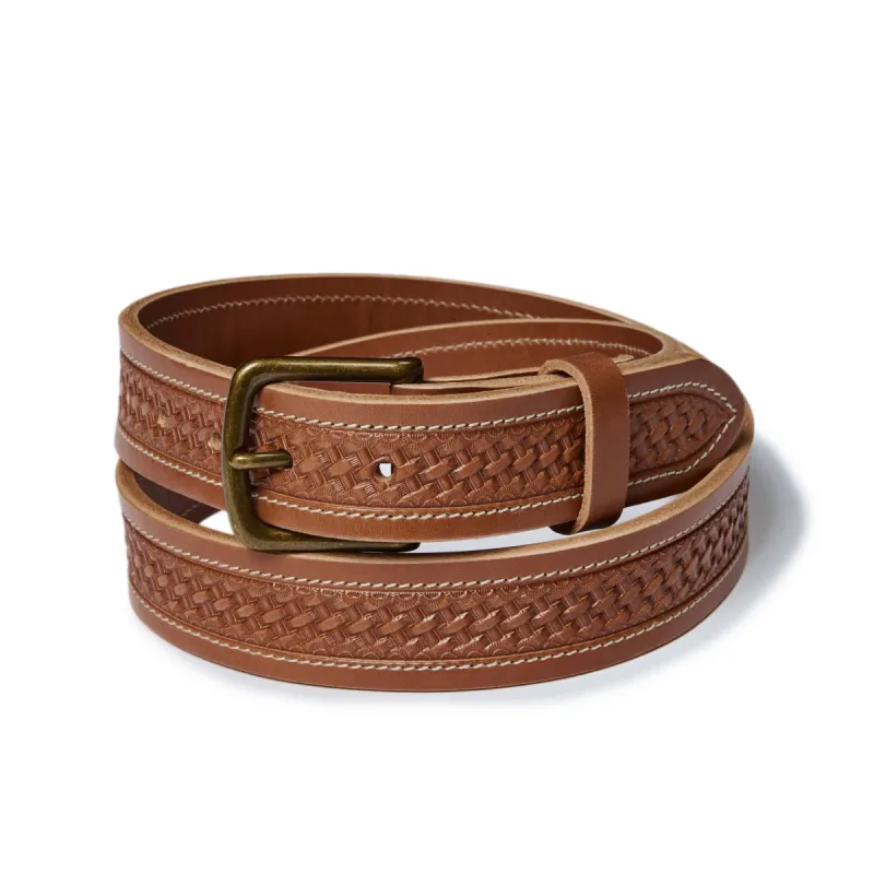 The Tooled Belt in Saddle Tan sold by Taylor Stitch