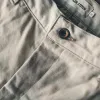 The Democratic Chino in Light Stone sold by Taylor Stitch