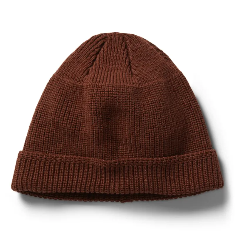 The Rib Beanie in Russet sold by Taylor Stitch
