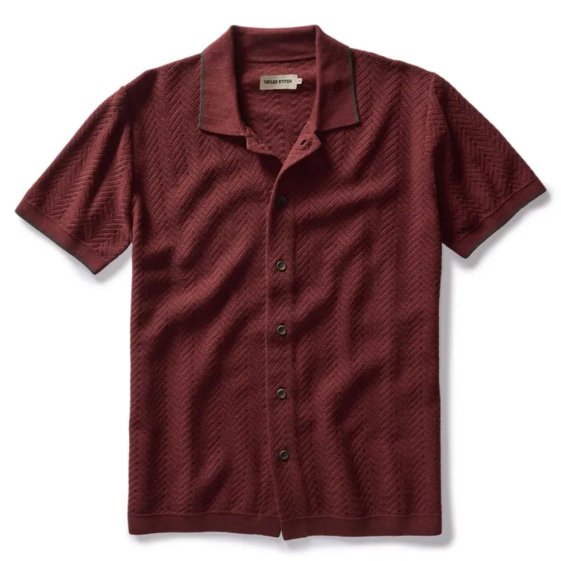 The Button Down Polo in Dried Cherry Herringbone sold by Taylor Stitch