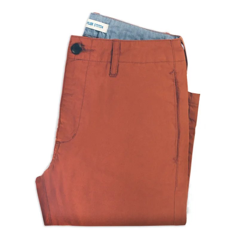 The Curator Pant in Rust sold by Taylor Stitch