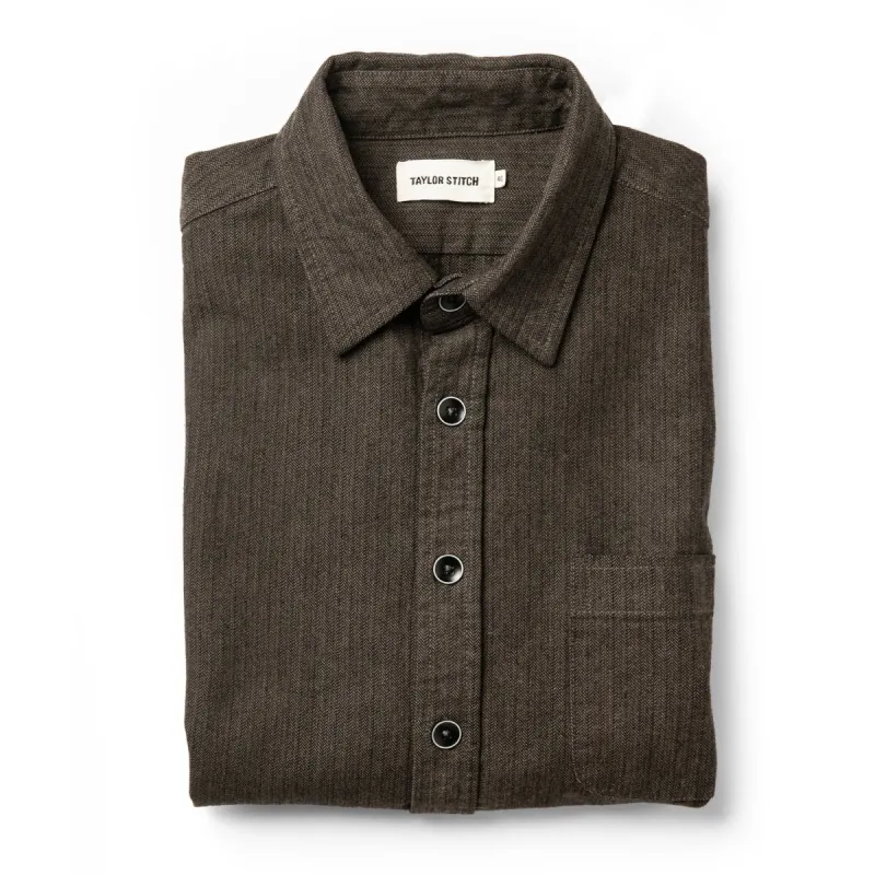 The Mechanic Shirt in Dark Olive Herringbone sold by Taylor Stitch