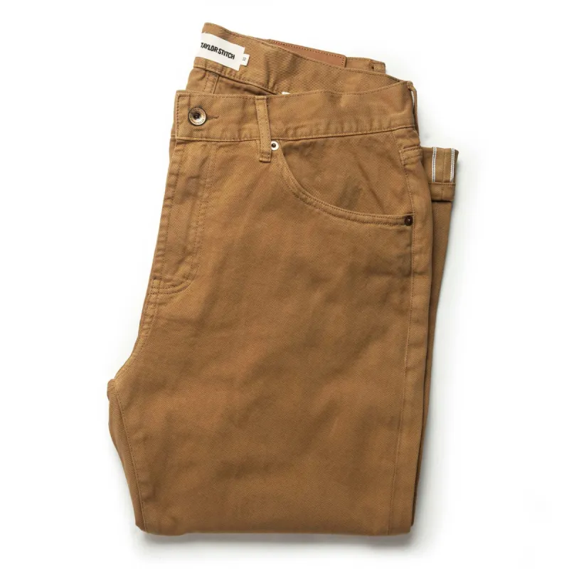 The Slim All Day Pant in British Khaki Selvage sold by Taylor Stitch