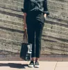 The Parsons Pant in Noir sold by Taylor Stitch