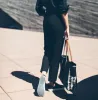 The Parsons Pant in Noir sold by Taylor Stitch